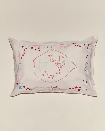 The Garden Party Pillowcases are white cotton pillowcases featuring vibrant abstract embroidery in red, blue, and pink—ideal for anyone who loves unique, colorful designs.