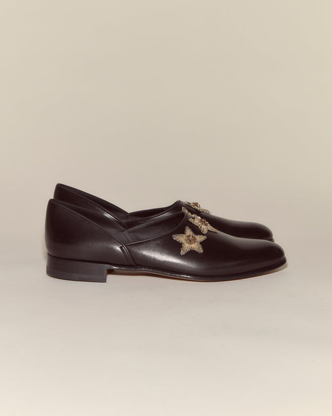 Bullion Star Shoes in black Napa leather feature gold bee embellishments and sequined stars, shown side by side against a plain background.