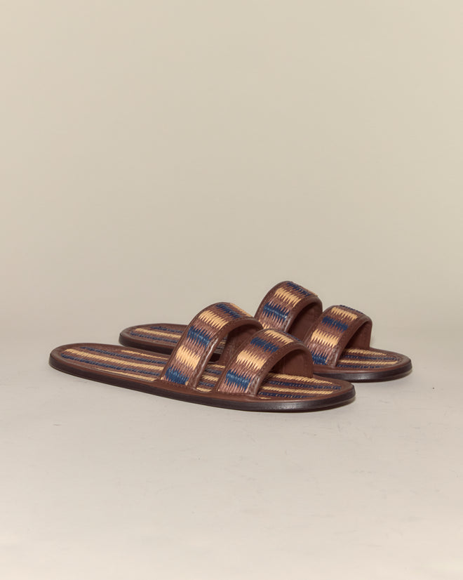 Duotone Summer Slides - Brown/Blue, featuring a woven design and two straps, are displayed on a neutral background.