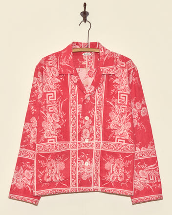 Unique Victoria Daisy Long Sleeve Shirt in red with white floral and geometric damask patterns, button-up, size M, displayed on a hanger against a beige wall.