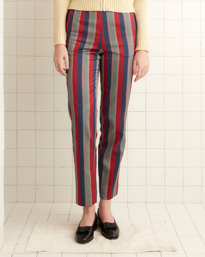 Red, gray, and navy striped  cotton viscose blend trousers with a high rise and straight leg fit.