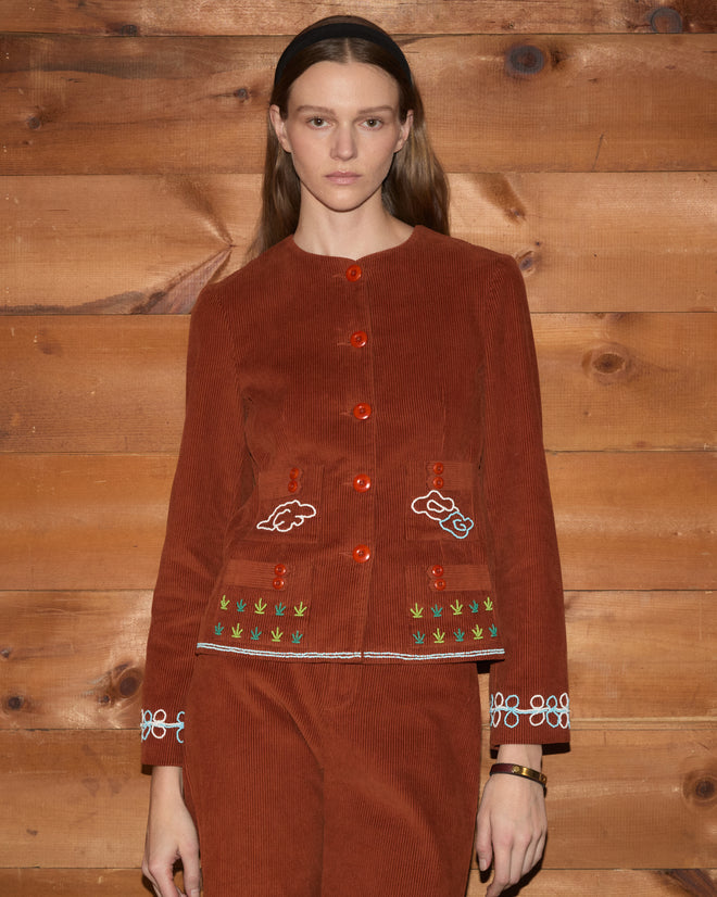 Cheval Corduroy Jacket in brown cotton with hand-beaded cloud and floral motifs on the pockets and cuffs.