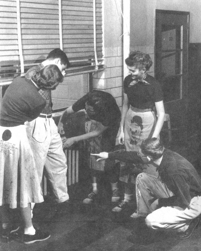 historical image of people wearing senior cord garments